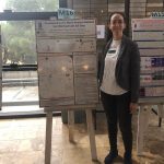 Gal presenting a poster at Graduate School Research Day 16.1.2019